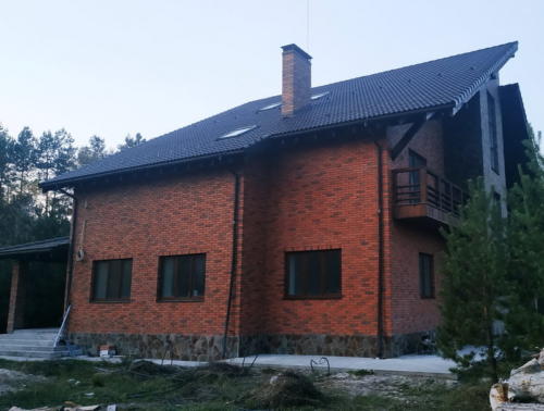 Дом с установленным тепловым насосом Geosun